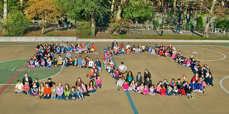 Caedmon staff and students celebrating their 50 year anniversary.