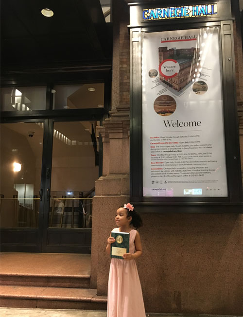 Lucy Castro, student at The Caedmon School performing music at Carnegie Hall